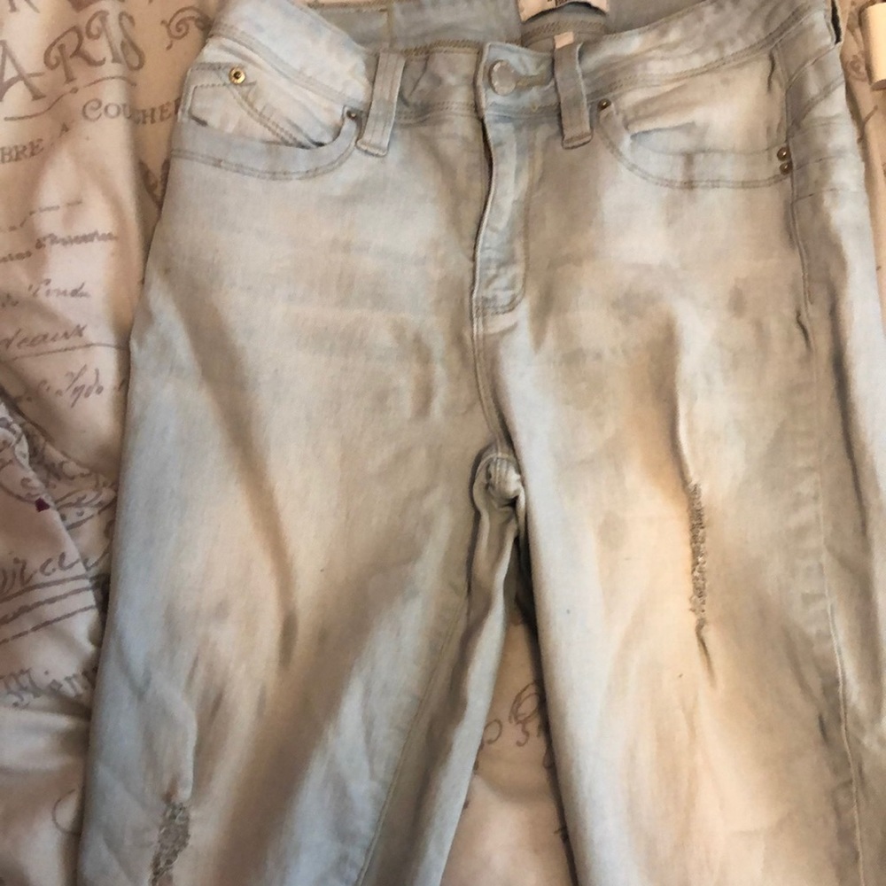 Light washed slightly ripped jeans